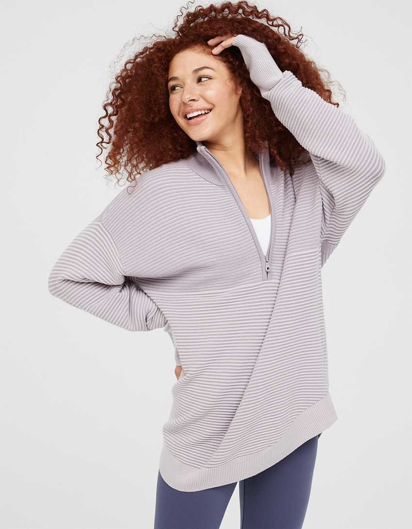 model wearing the quarter-zip in lilac