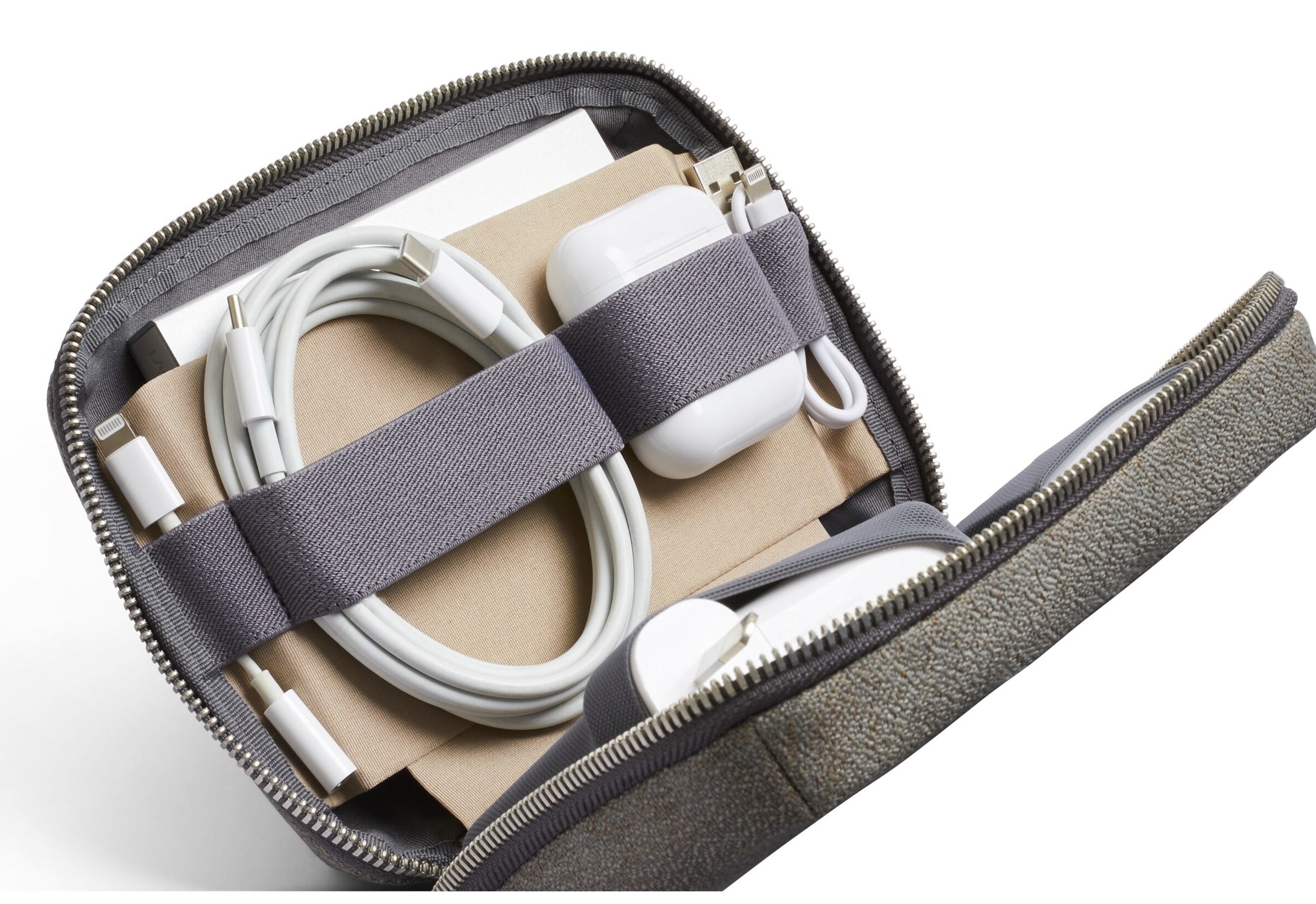 the tech kit unzipped to show accessories neatly stored inside