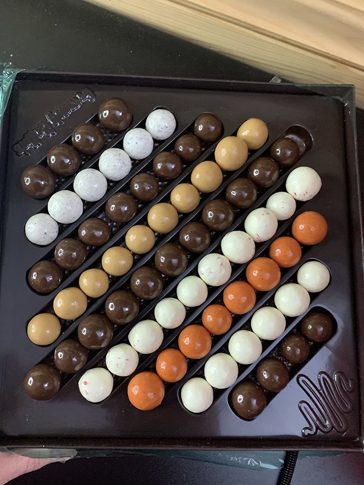 Reviewer photo of a box of malted milk balls in various colors