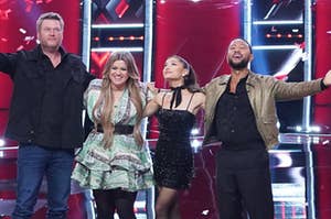 Blake Shelton, Kelly Clarkson, Ariana Grande, and John Legend stand together in a line as confetti falls around them