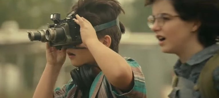 Phoebe and Podcast, who is taking a picture with his goggles, in &quot; Ghostbusters: Afterlife&quot;