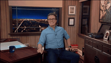 GIF of Stephen Colbert taking off and showing off his fur-lined slipper