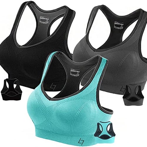 Set of three sports bras in aqua, black, and gray
