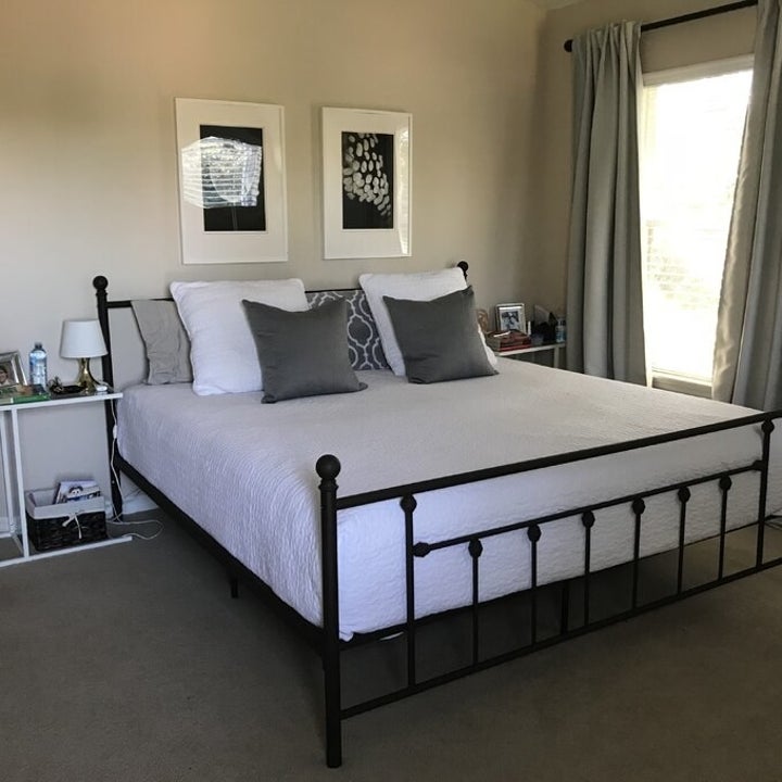 a reviewer photo of the bed frame