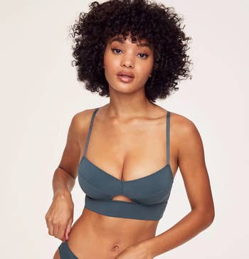 Model wearing gray bra and panty set