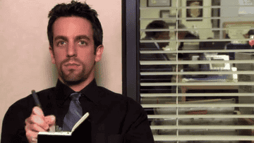 Gif of Ryan from The Office writing in his notebook