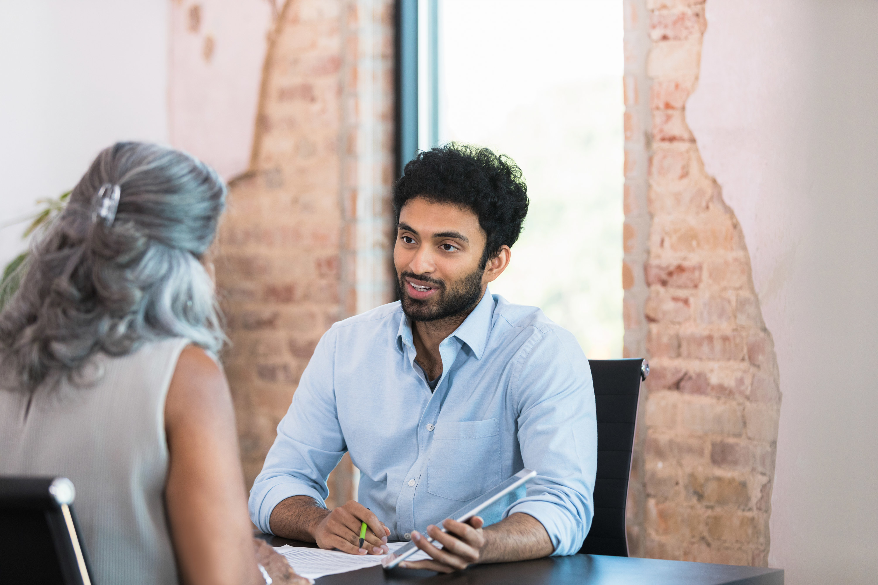 Man in a meeting with his boss