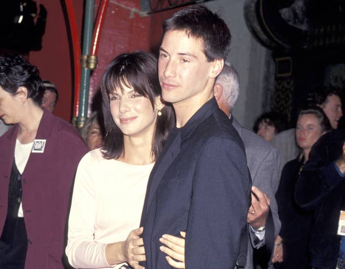 Keanu and Sandra pose in an old photo