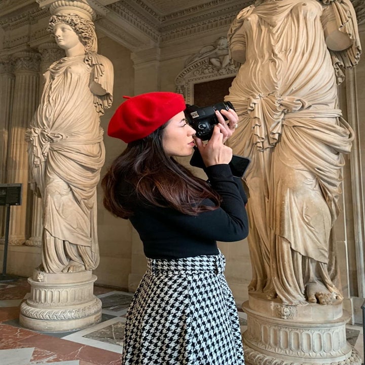 reviewer wearing the red beret