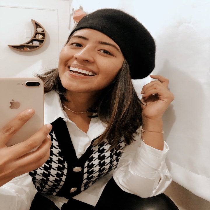 another reviewer wearing the black beret