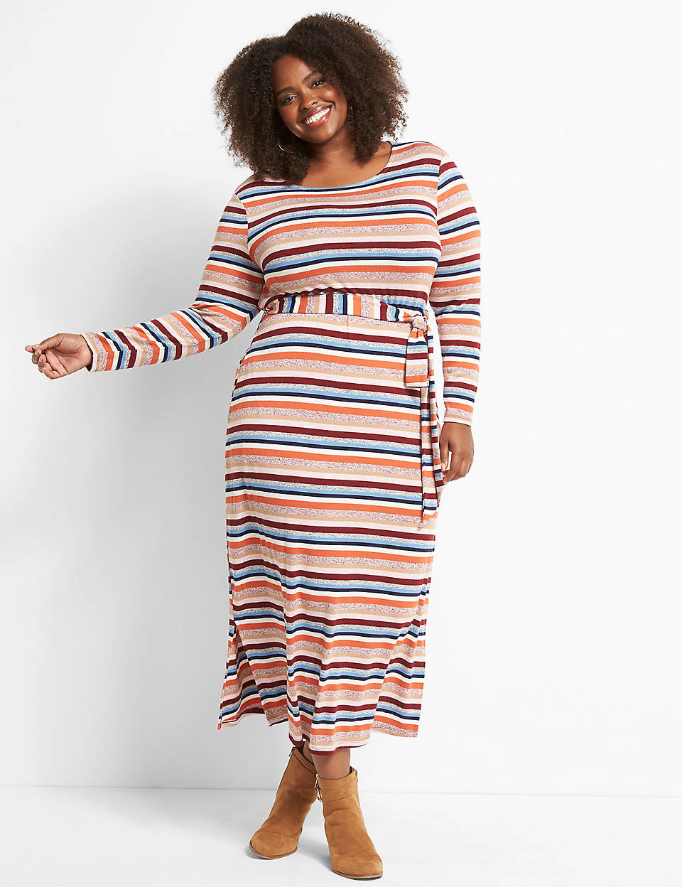 model wearing the midi dress withe orange, purple, blue, and tan horizontal stripes