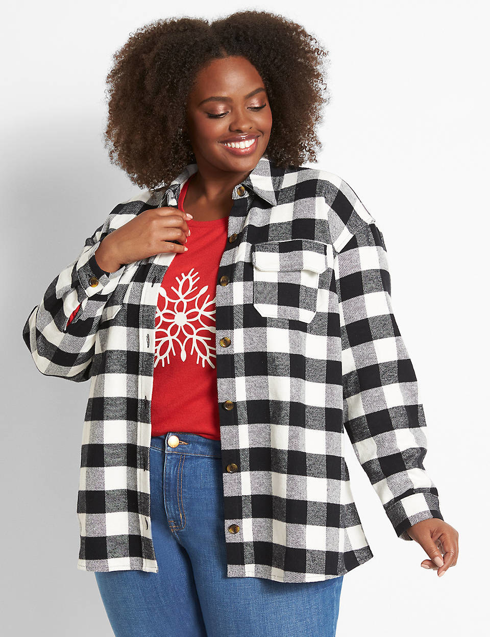 model wearing the black and white plaid shacket