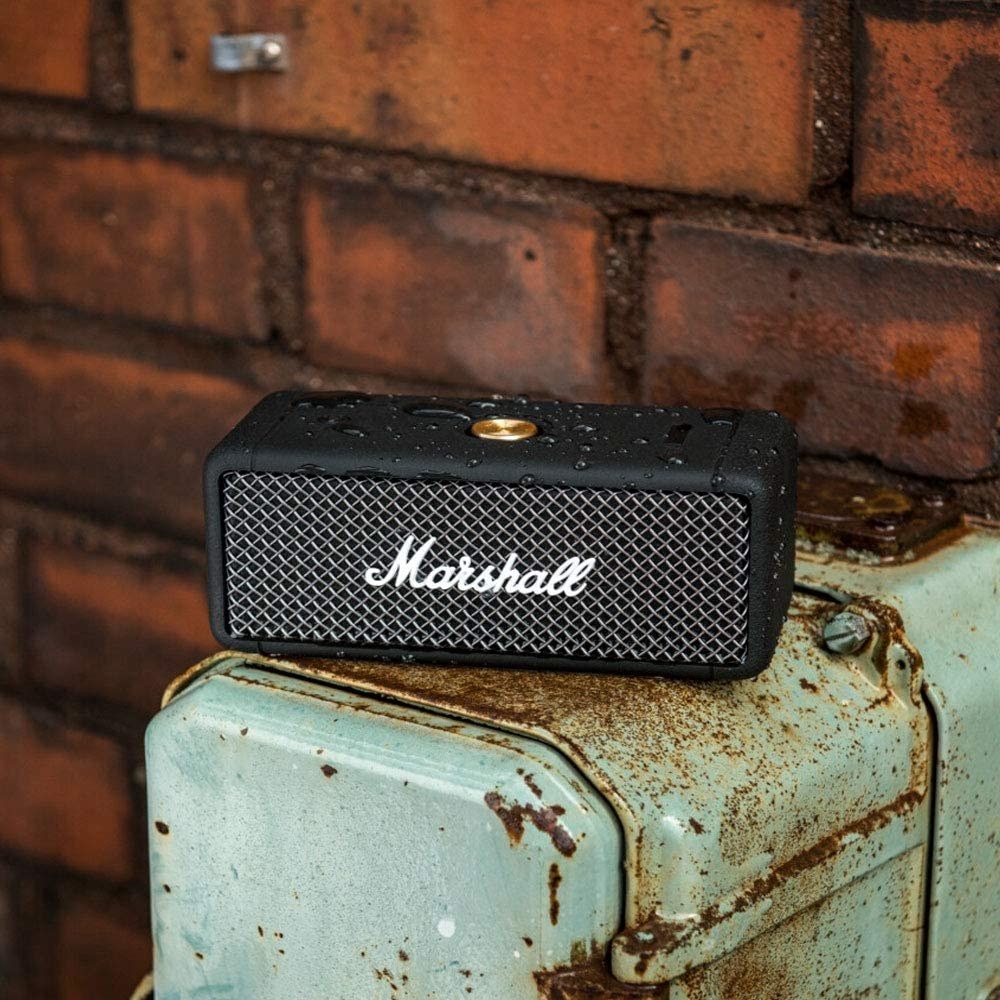 rectangular speaker that says marshall on it