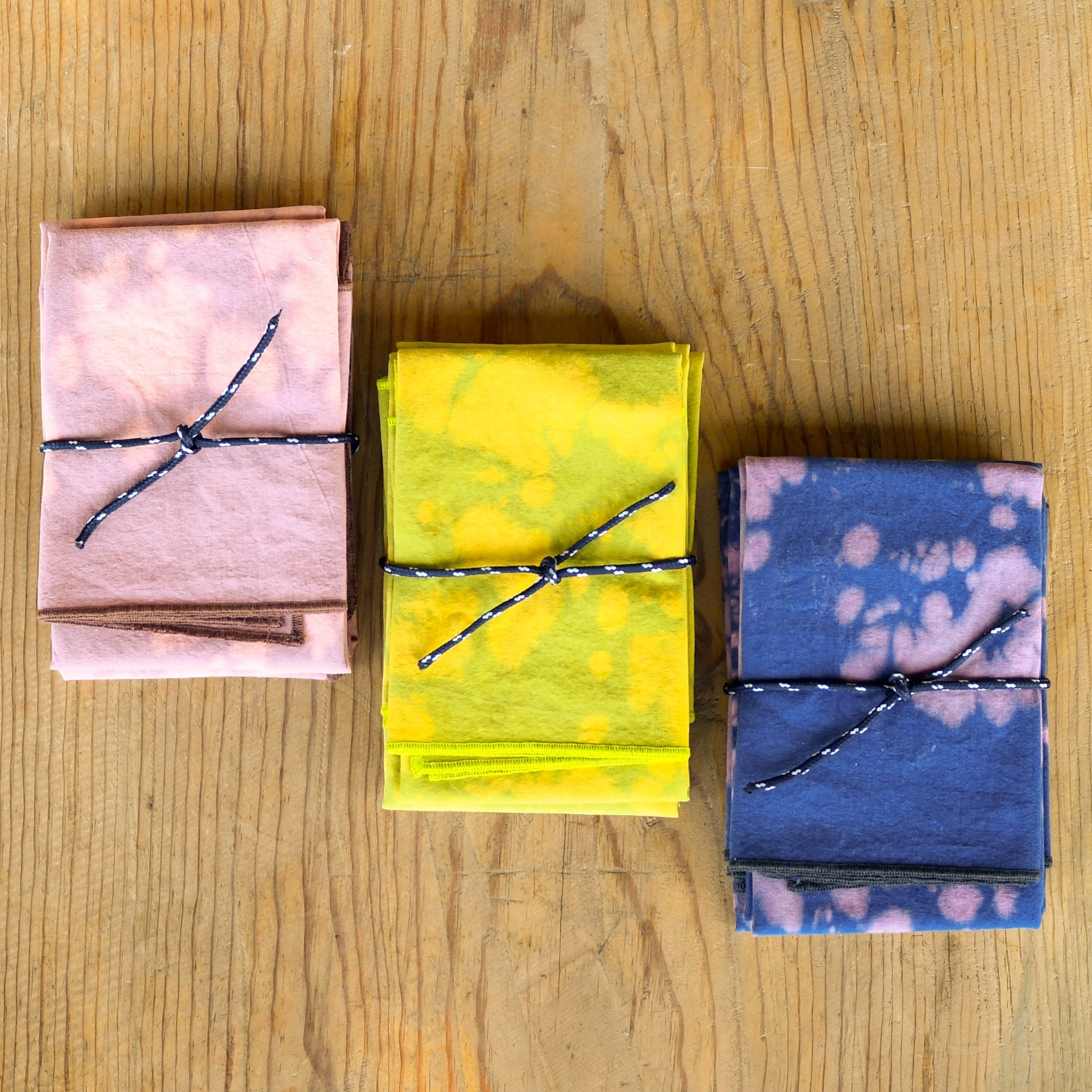 tie dye napkins in pink, yellow, and purple