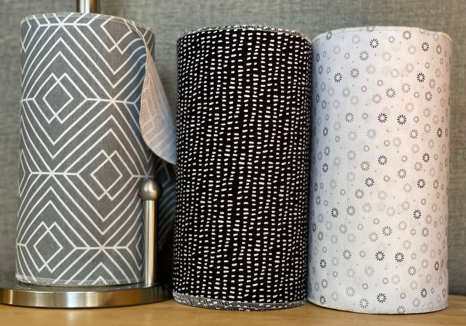three grayscale paperless paper towels