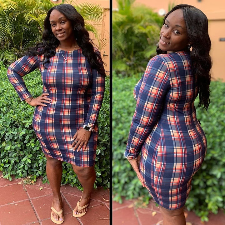 Reviewer wearing the blue, red, and yellow plaid dress