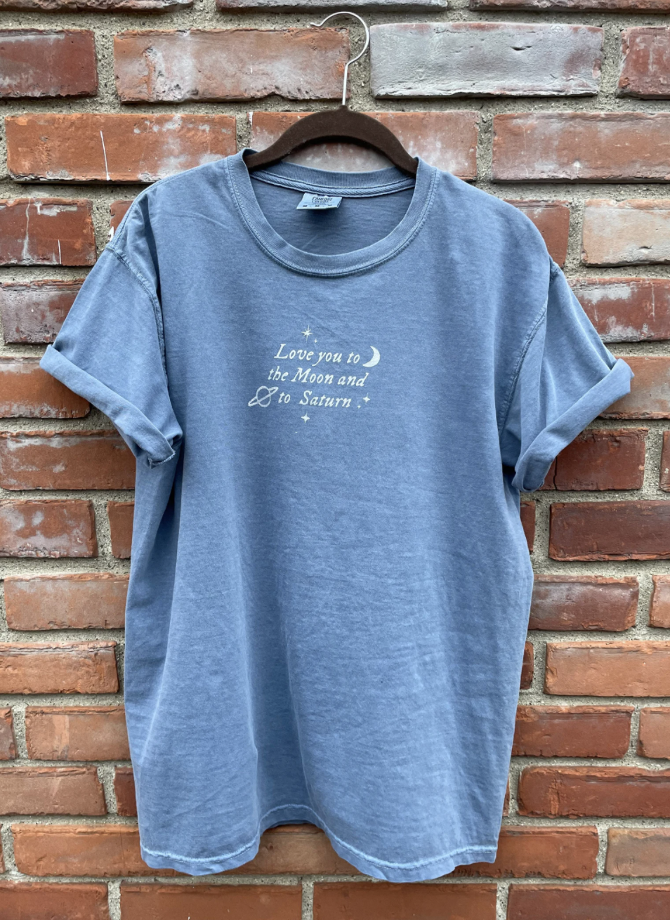 a blue tee that says &quot;love you to the moon and to saturn&quot;