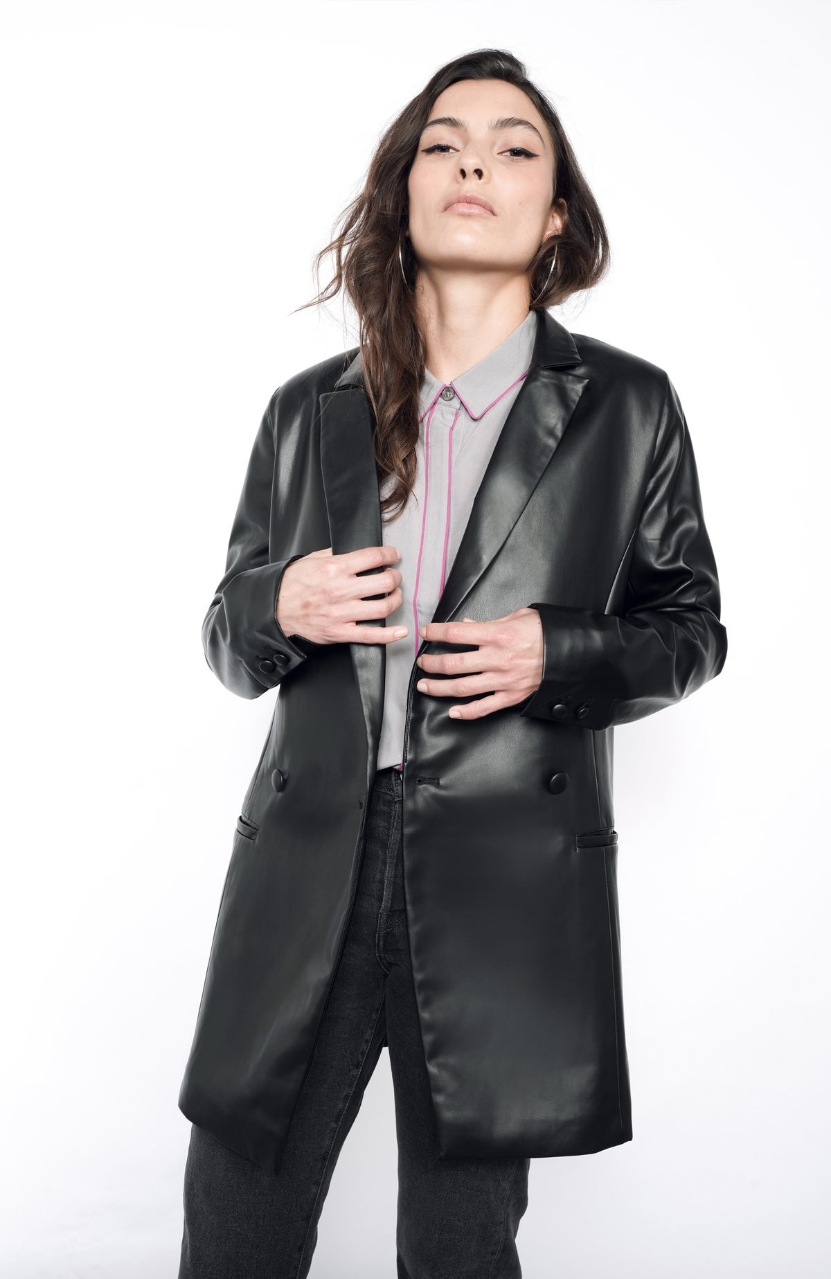model wearing the faux leather blazer