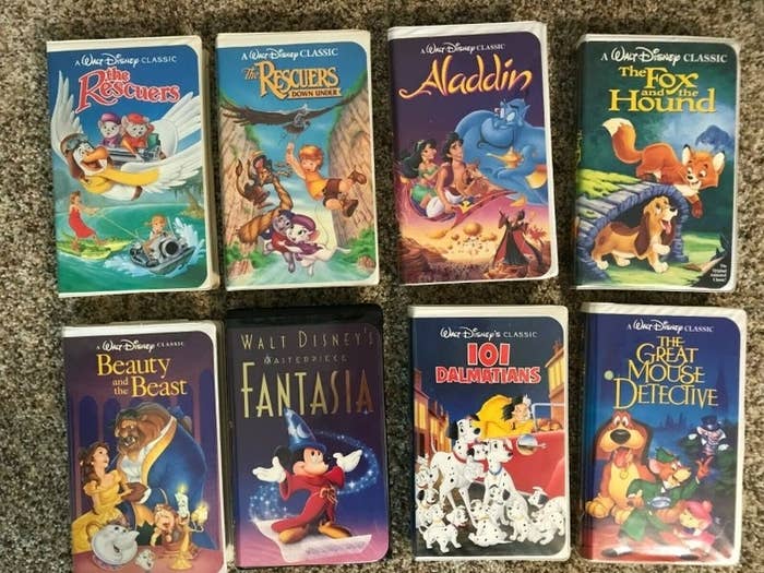 Eight Disney VHS tapes on a table