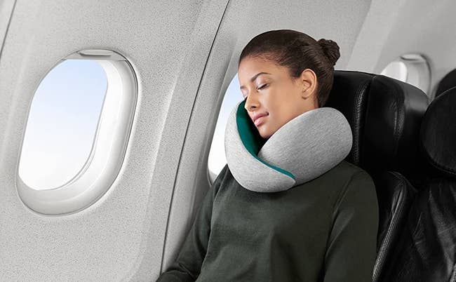 person using the travel pillow