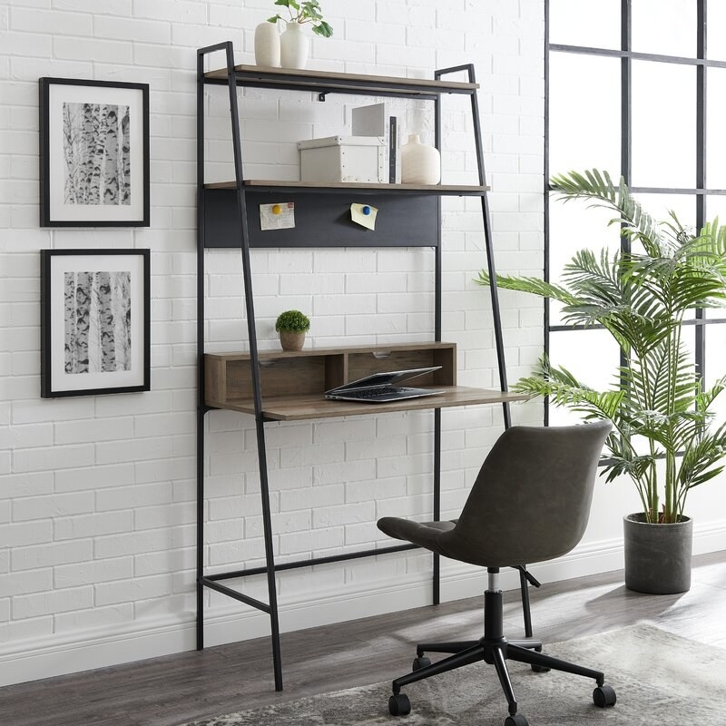 Desk and bookshelf with a chair next to it