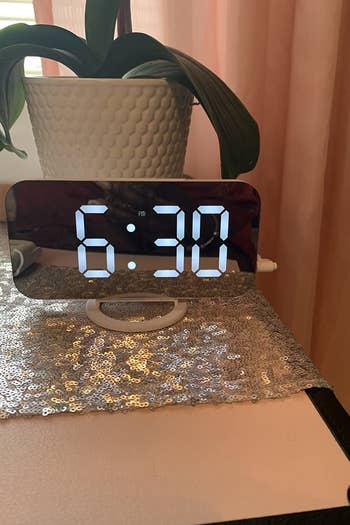 the clock on another reviewer's end table