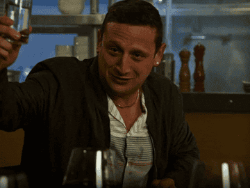 Tim Robinson from the TV show &quot;I Think You Should Leave&quot; giving a drink toast