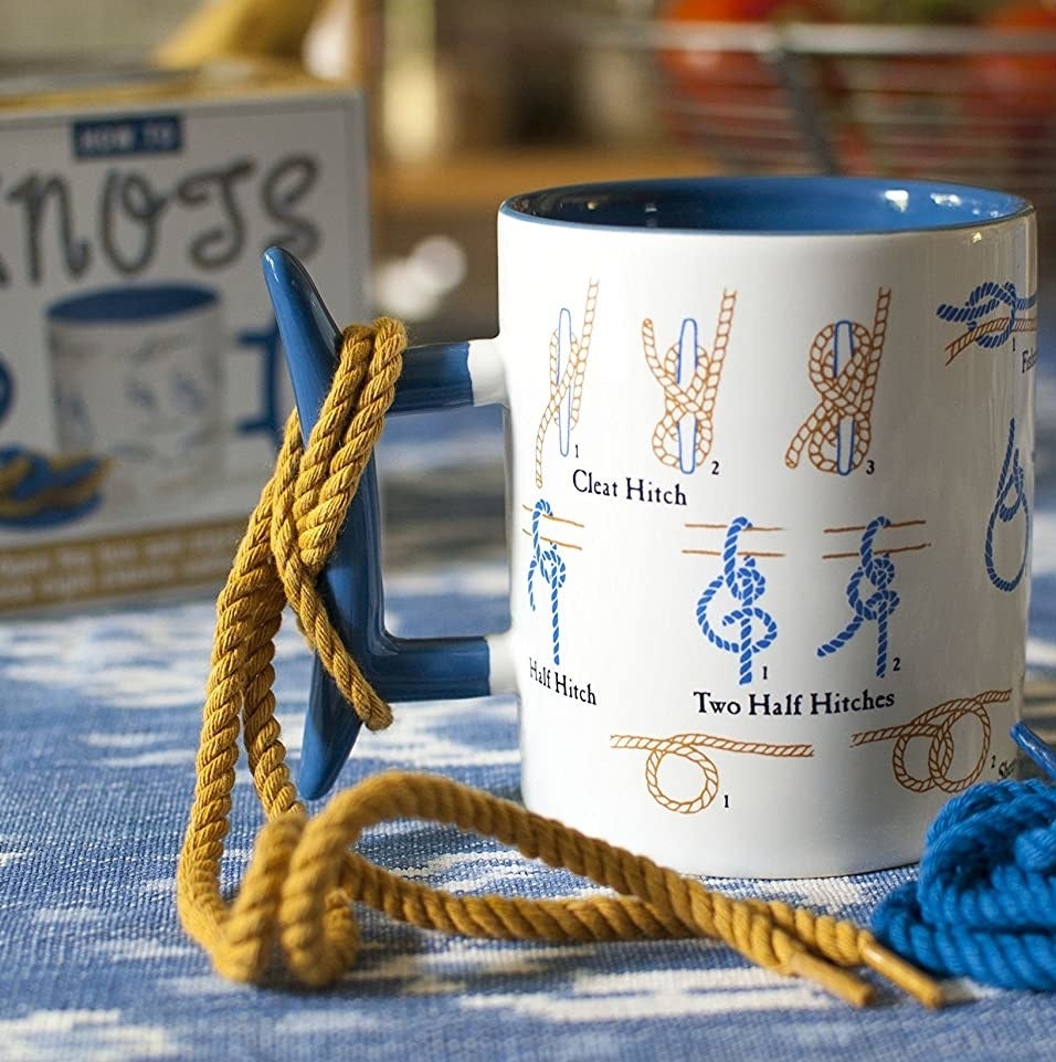 The mug with instructions on the body of the mug and rope around the handle