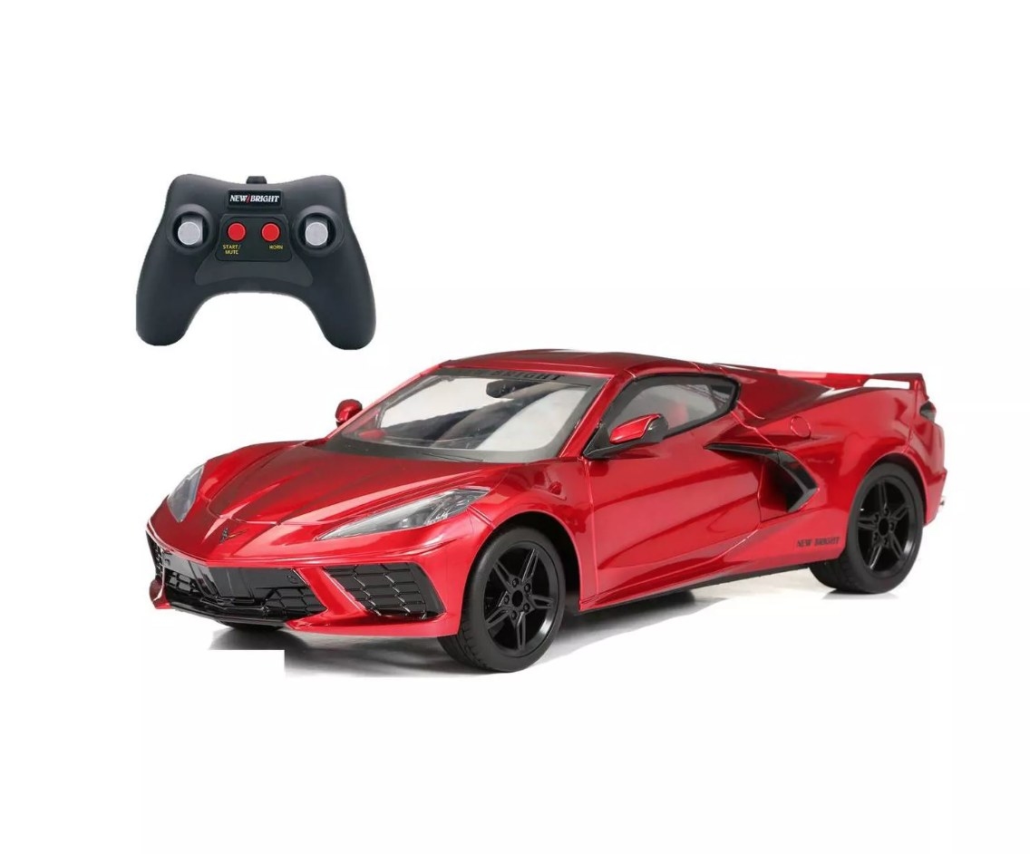 Red toy Corvette with black remote control