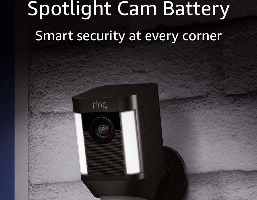 the security camera with built-in spotlight mounted on the outside of a home
