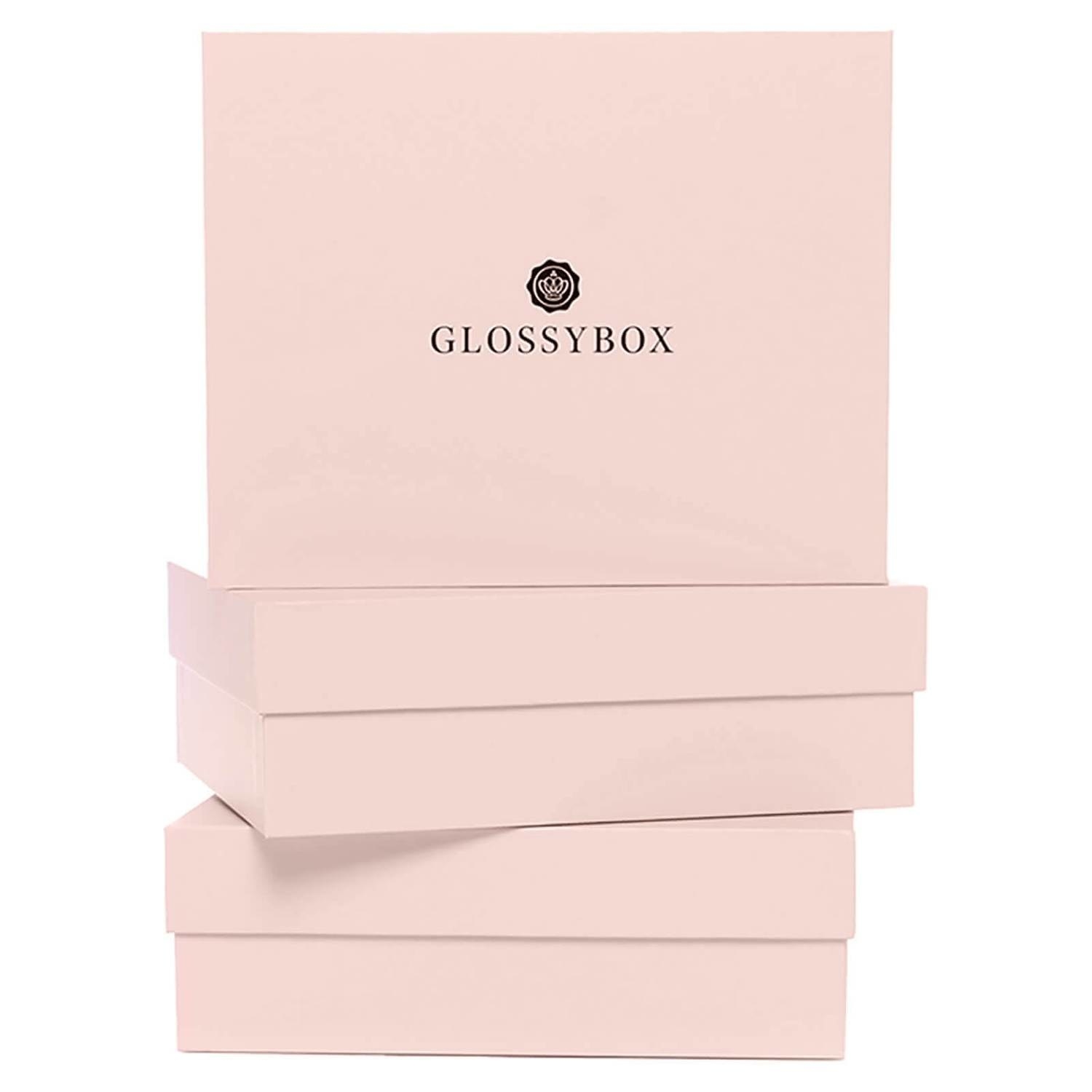 stack of pink boxes that say Glossybox on them
