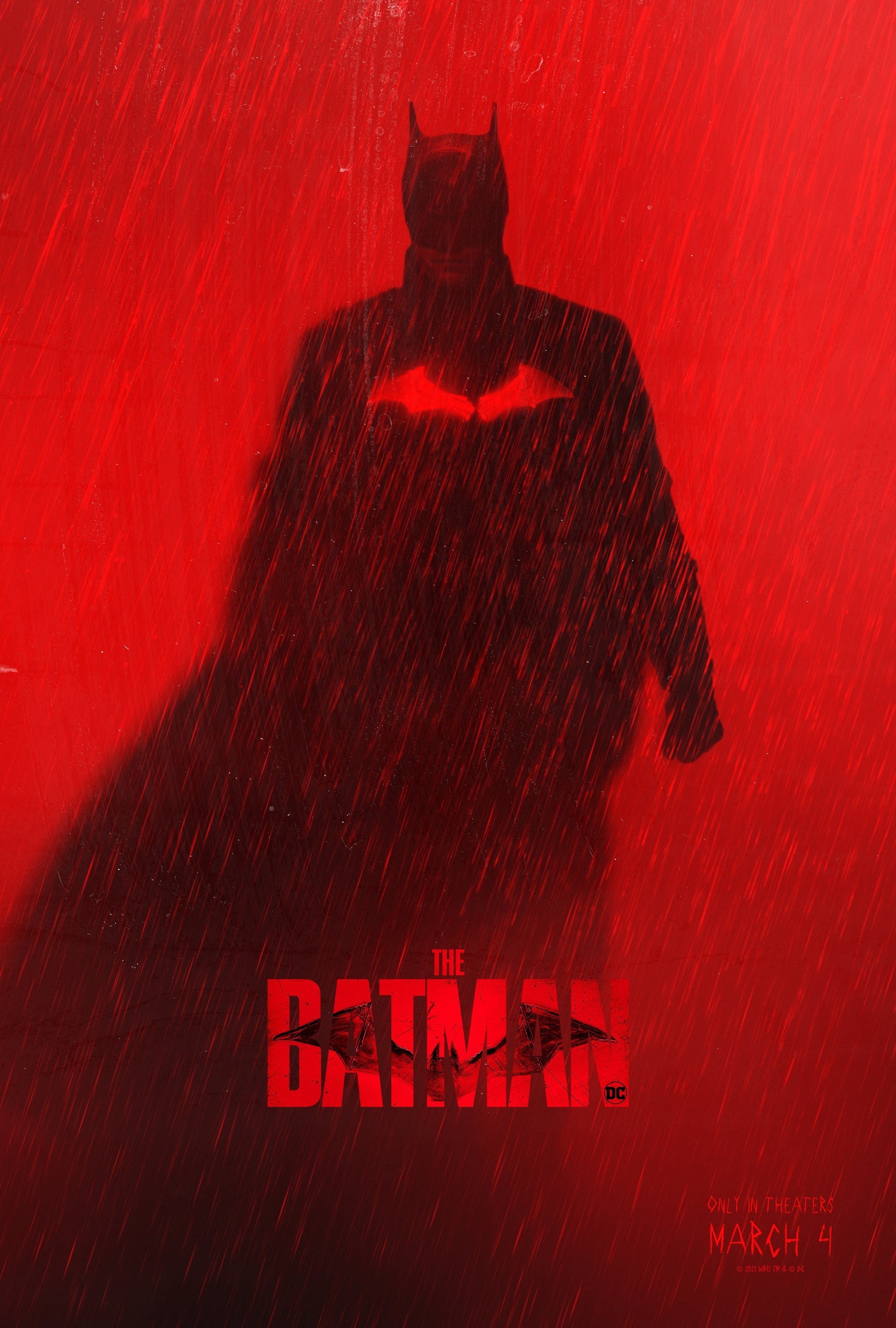 The Batman poster featuring the Caped Crusader walking through the rain