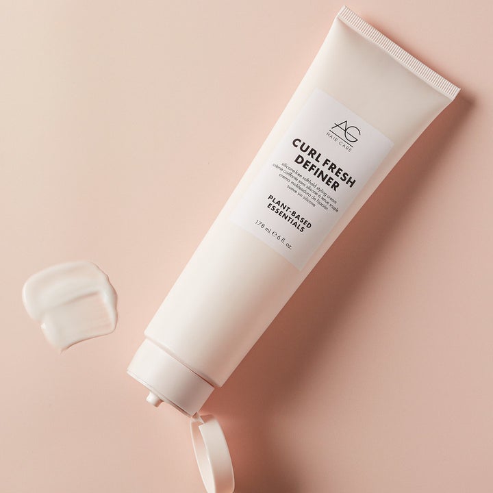 an open tube of the curl refreshing cream