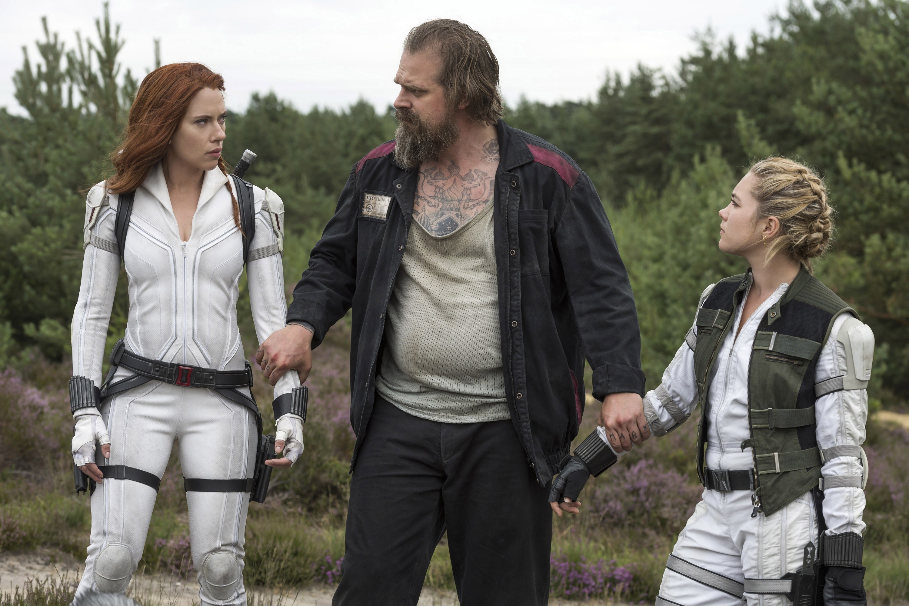 (L-R) Natasha Romanoff (Scarlett Johansson), Alexei Shostakov (David Harbour) and Yelena Bolova (Florence Pugh) in &quot;Black Widow&quot;