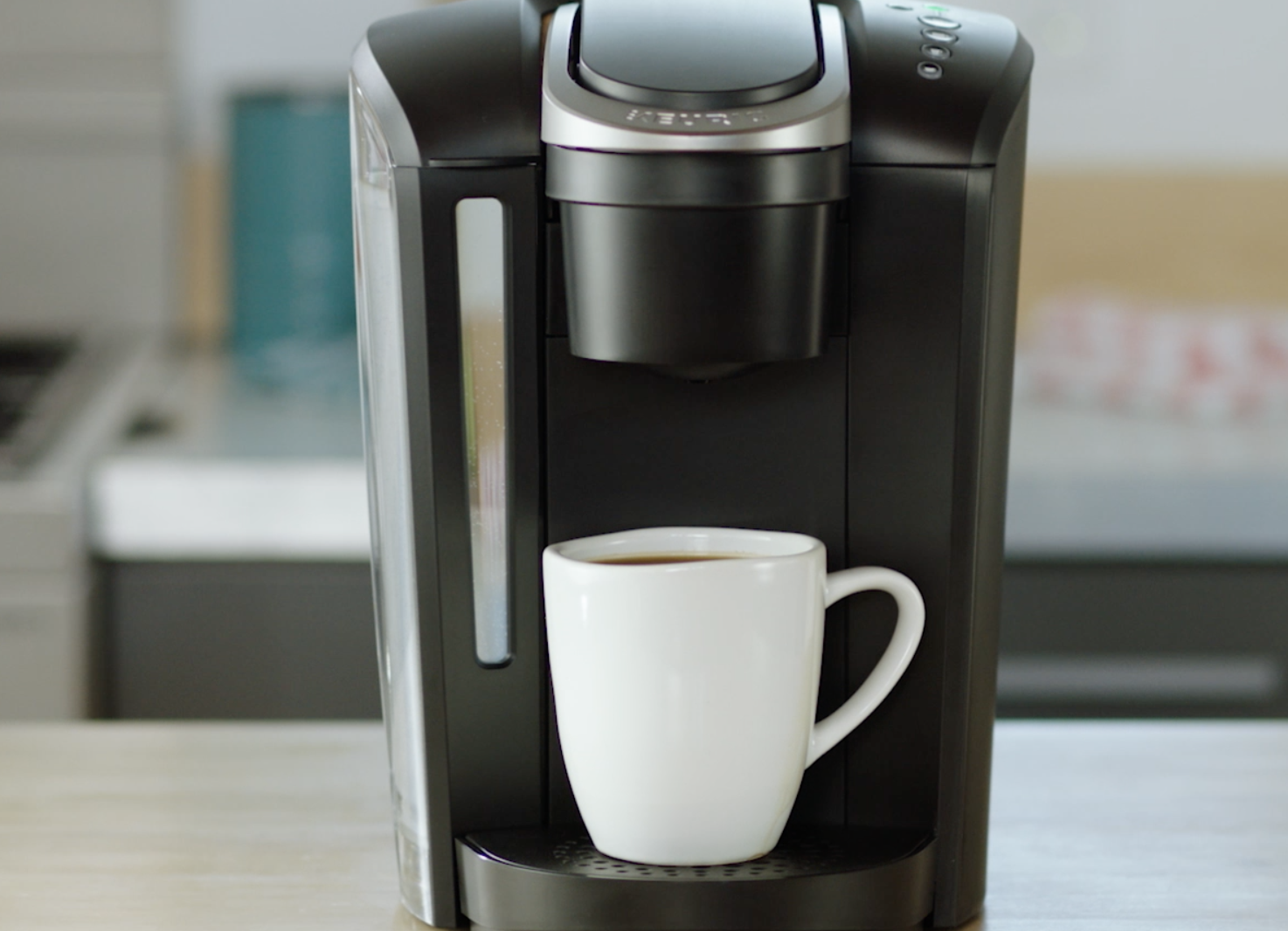 keurig machine brewing coffee