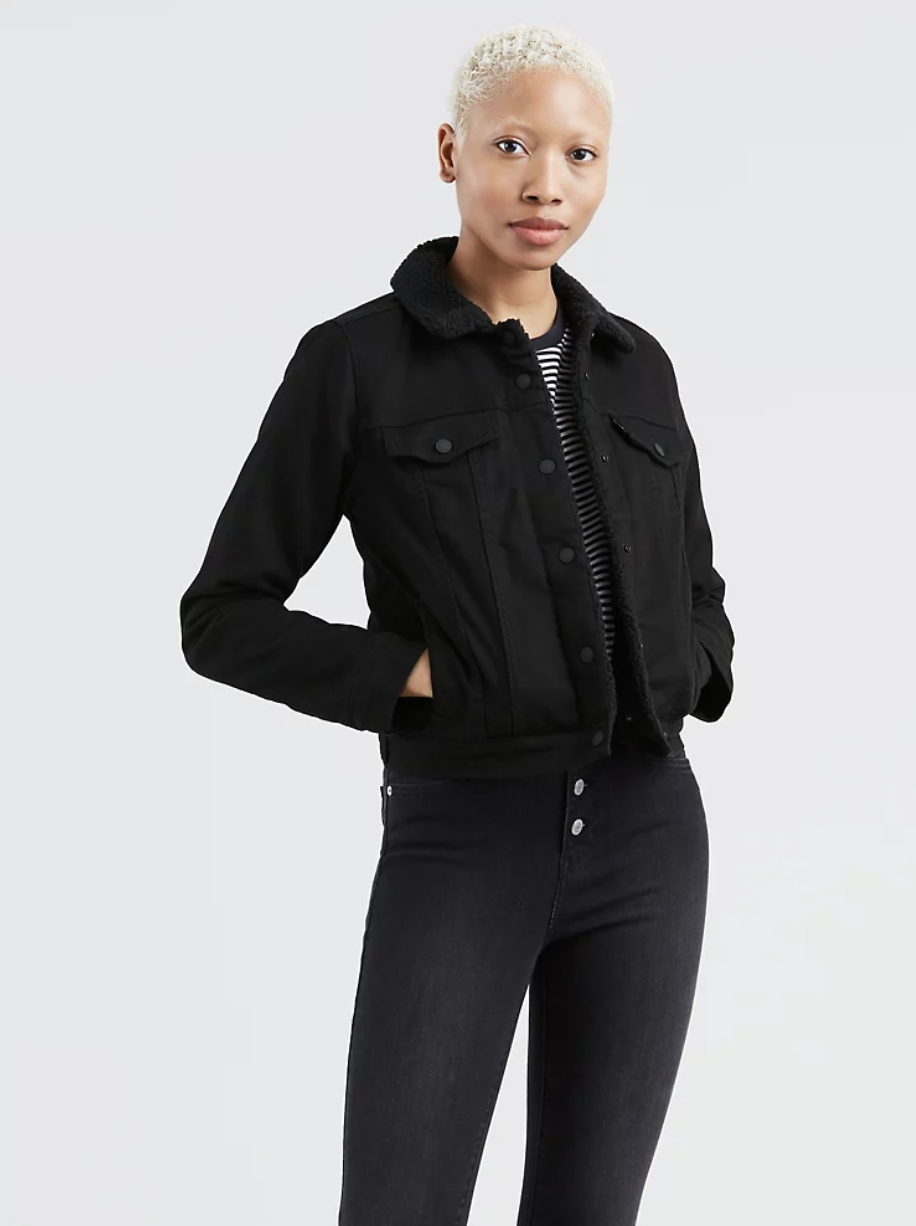 Model in black trucker jacket