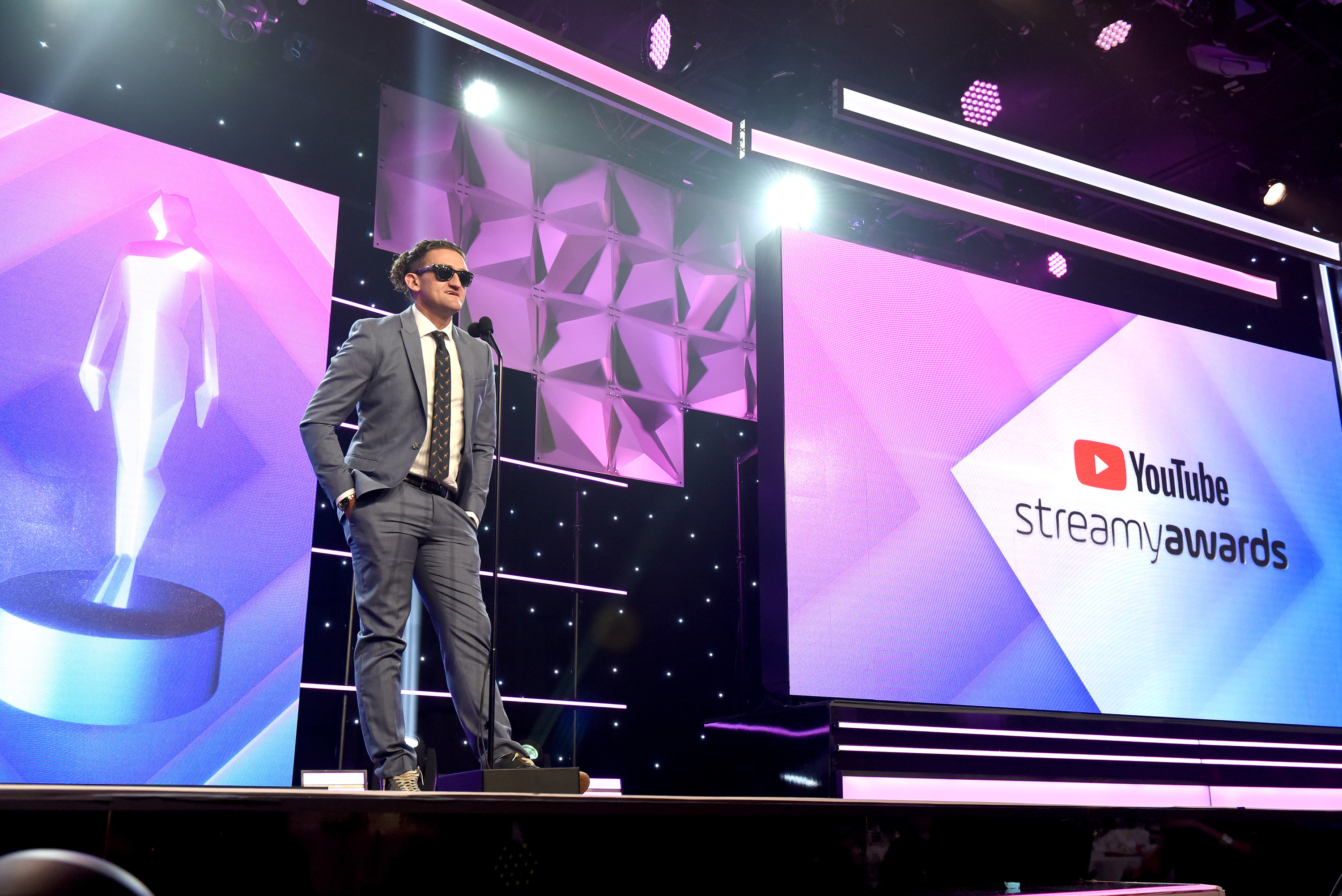 Casey speaking onstage at the YouTube Streamy Awards