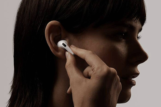 model wearing airpods pro