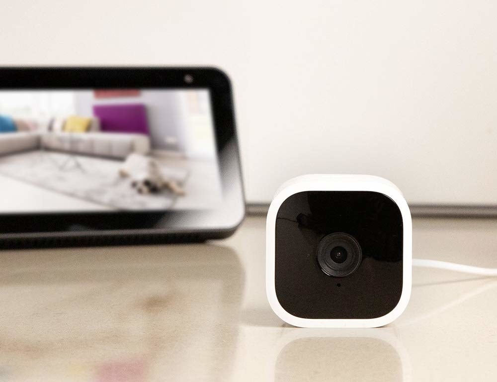 A tiny security camera on a table