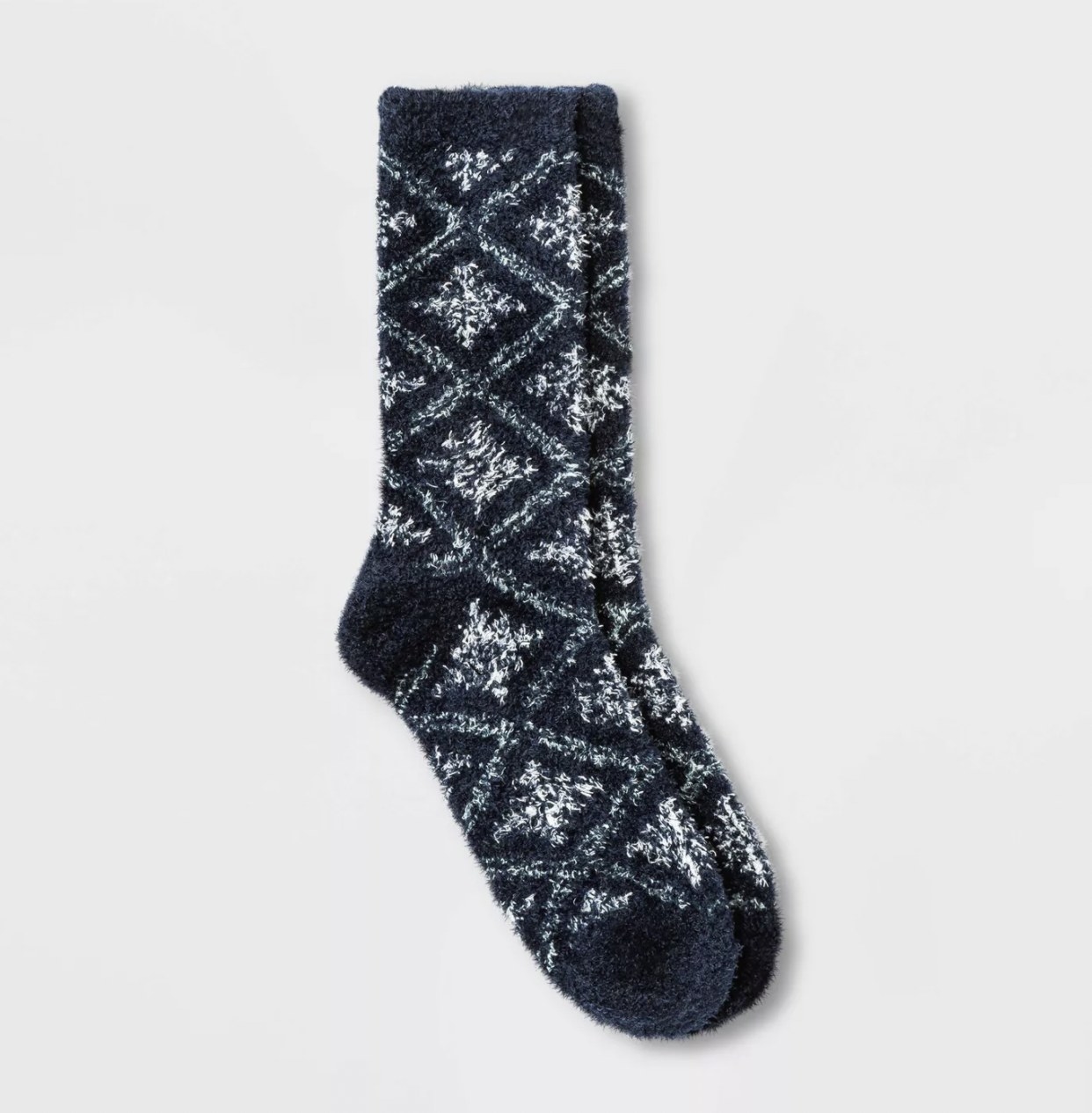 The blue socks with white snowflakes in diamonds