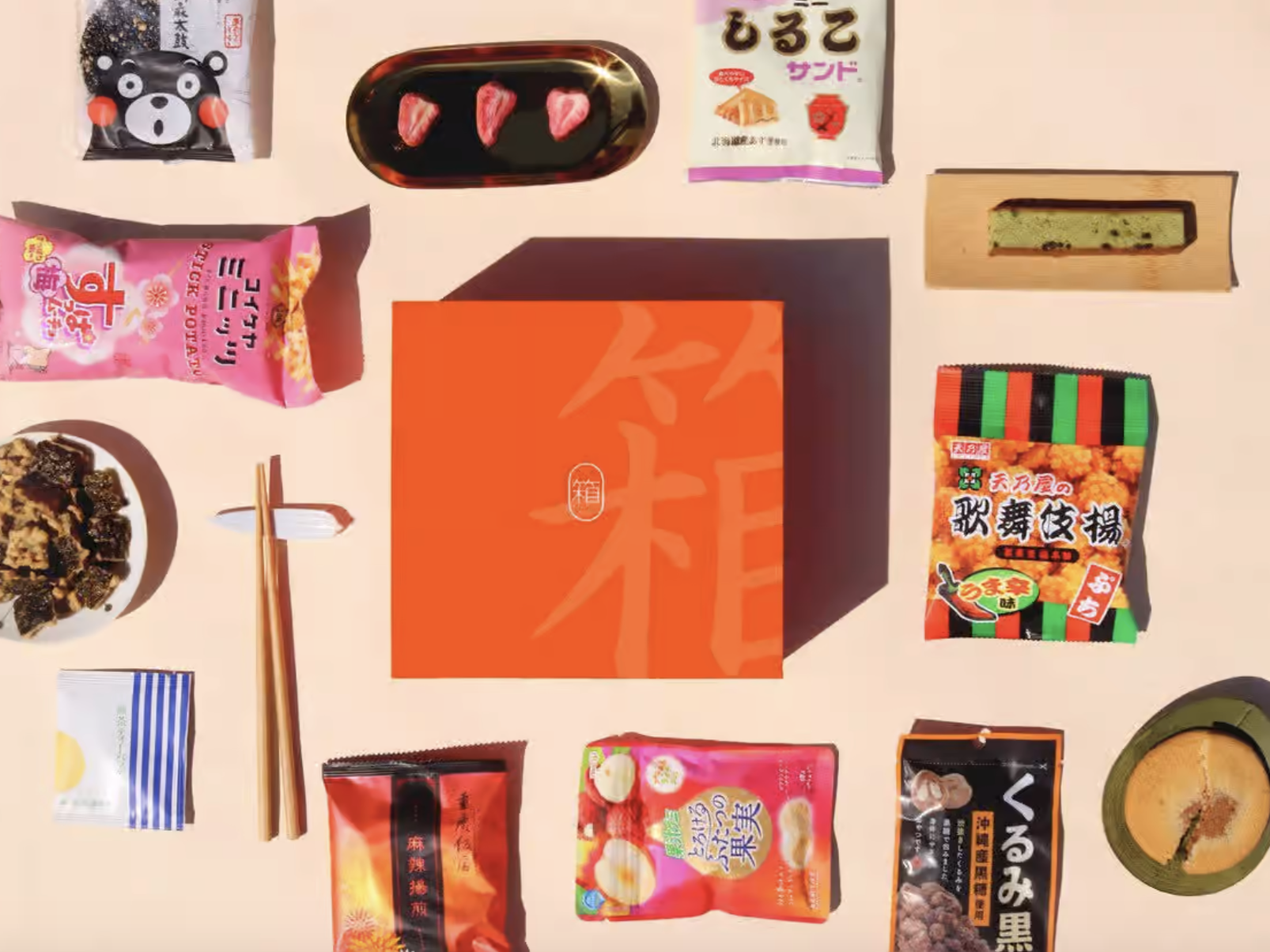 Japanese snacks, orange box, chopsticks