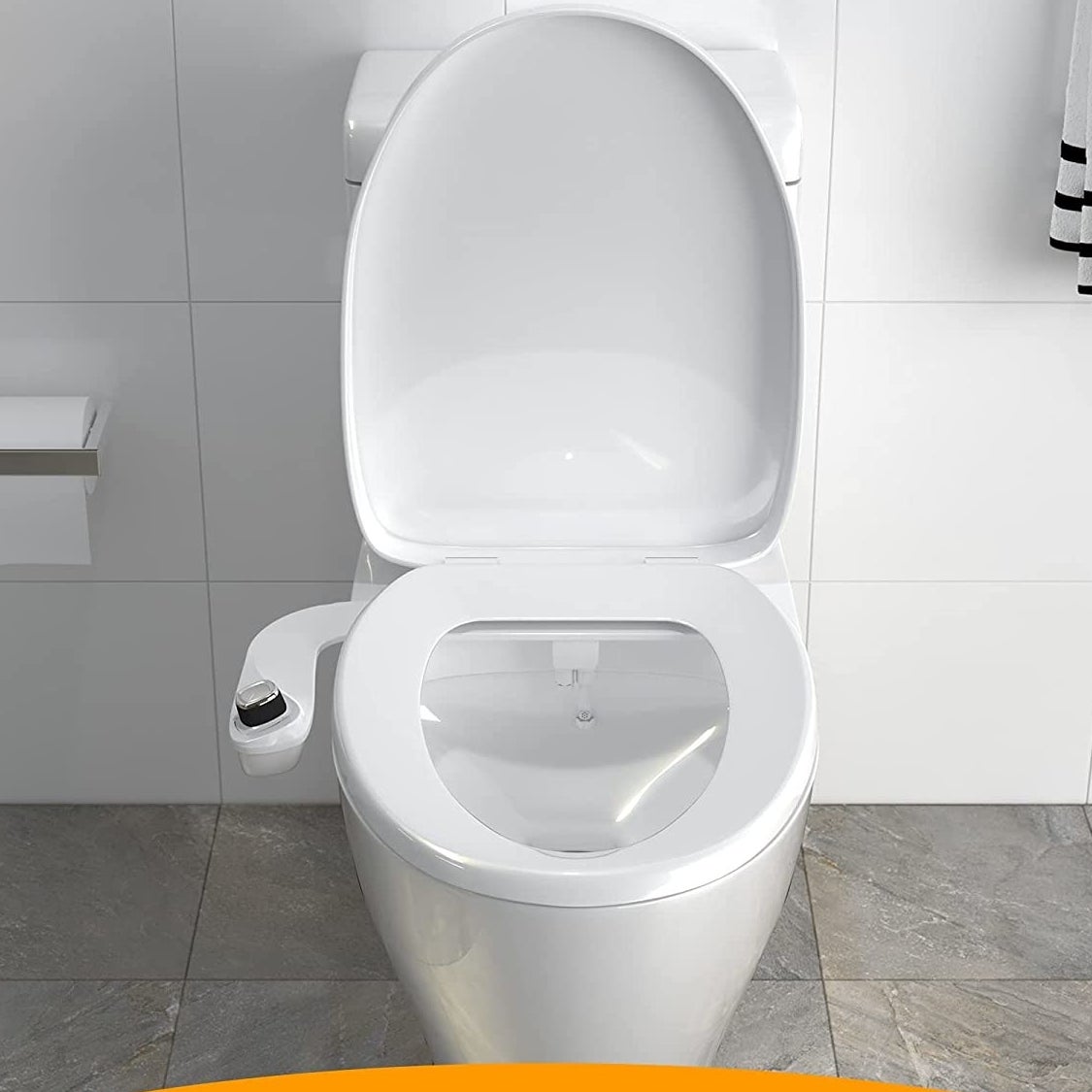 A toilet with the bidet attachment on it