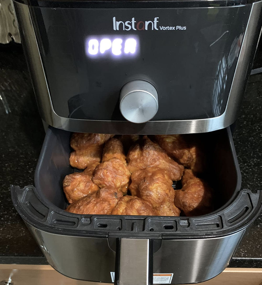 instant air fryer with meat in it