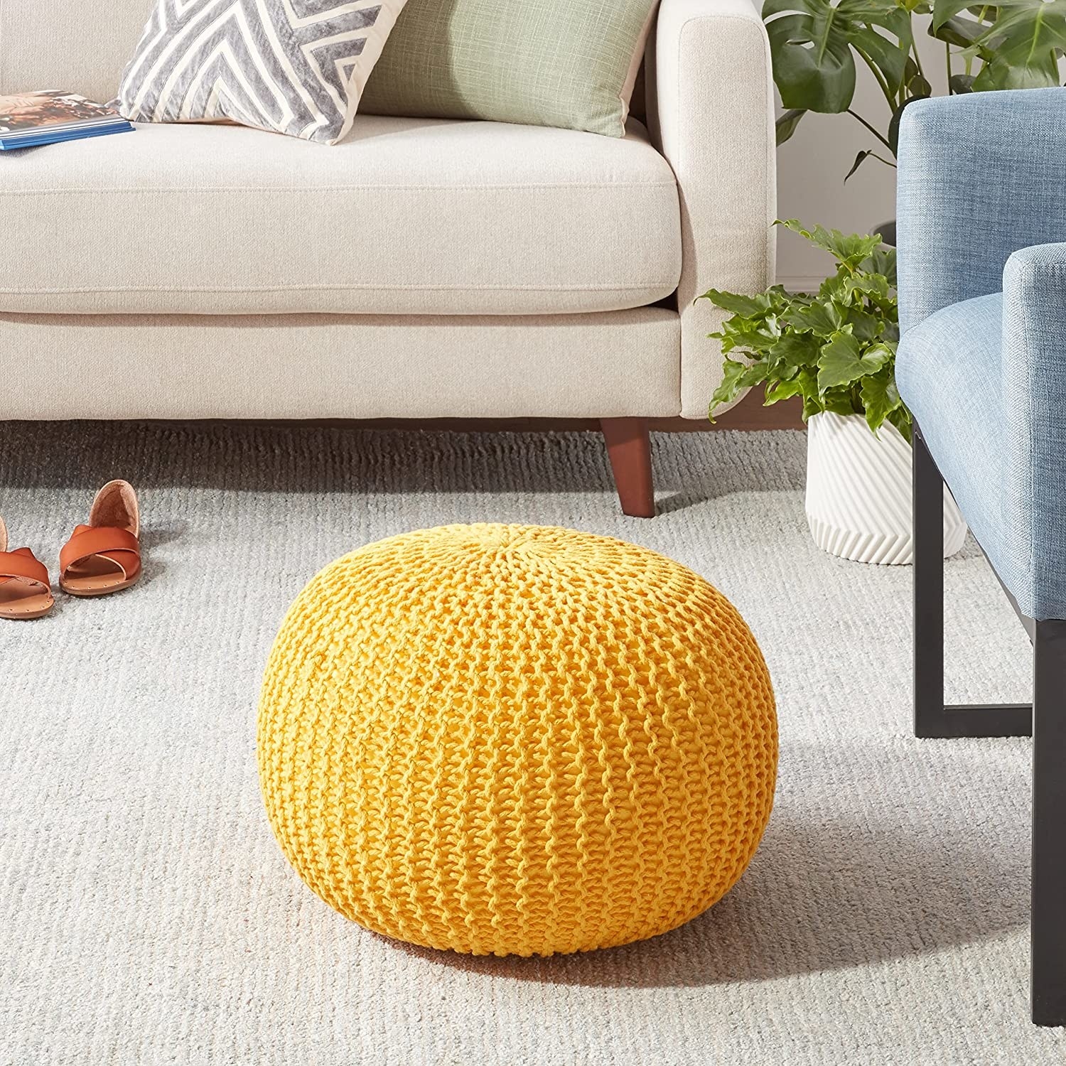 The pouf in the middle of a living room