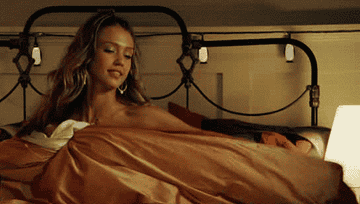gif of jessica alba in bed making a come hither motion with her finger