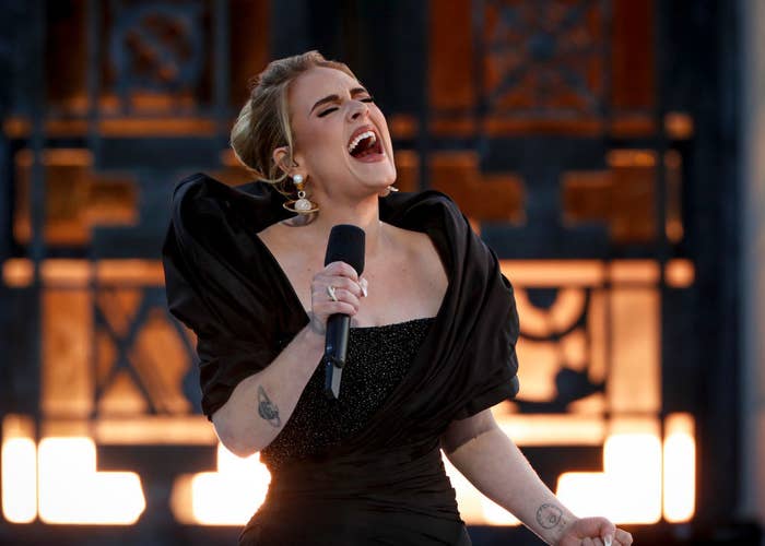 Adele reaching for a note