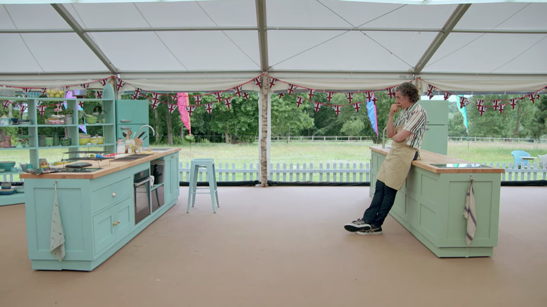 Giuseppe standing very far away from his oven