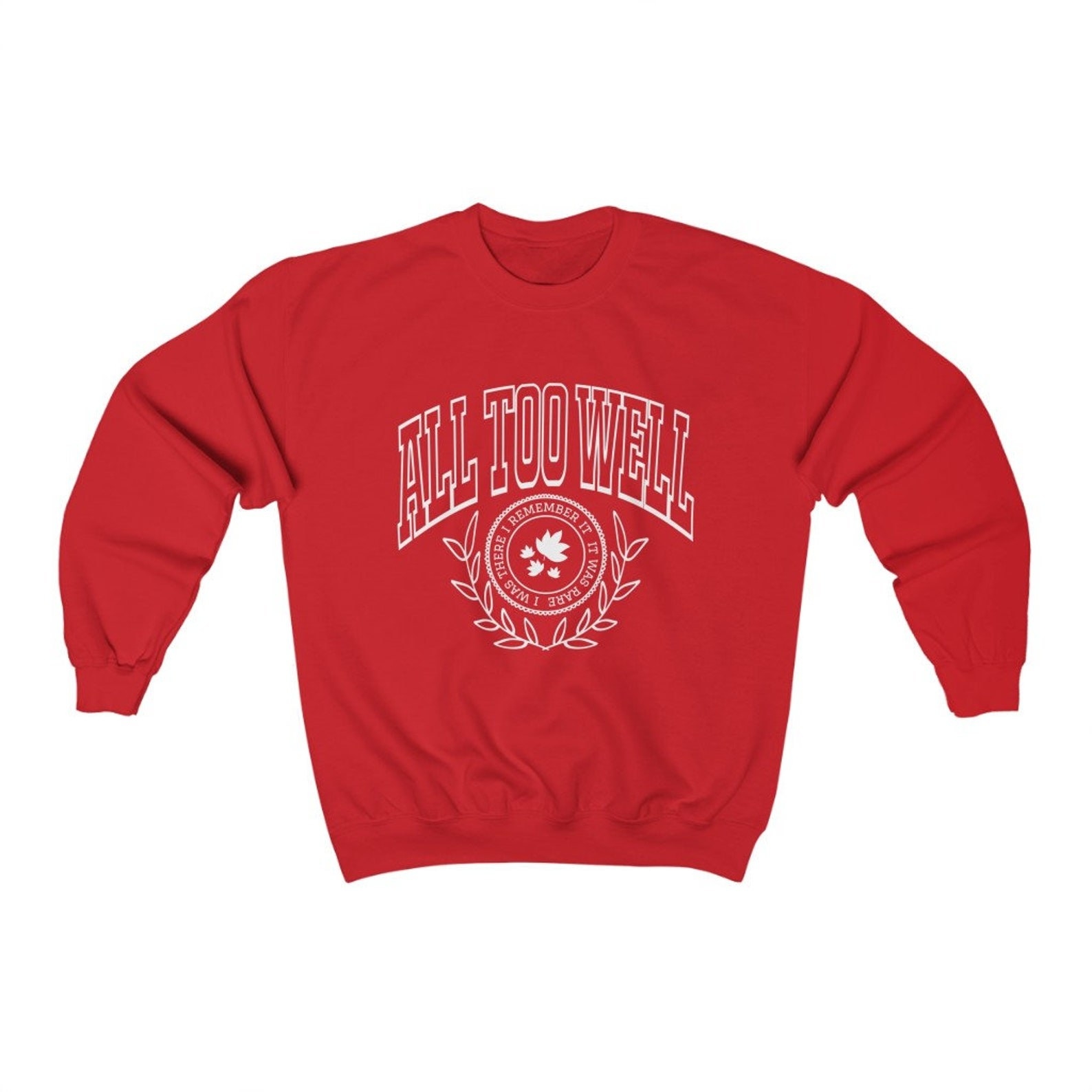 a red sweatshirt that says "all too well" on it