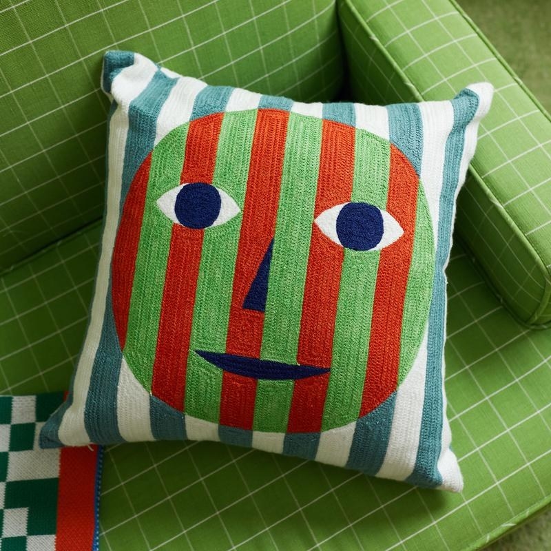 a pillow with a face on it