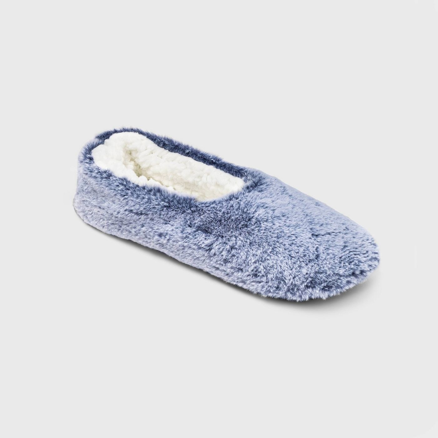 A blue cozy slipper sock with white fluffy insides